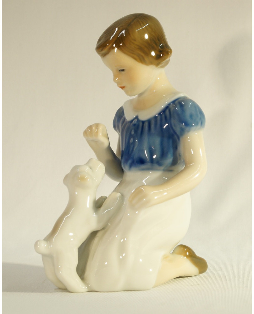Child with puppy by Royal Copenhagen