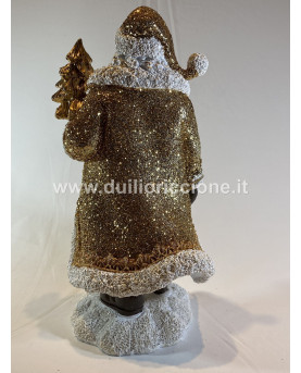 Santa Claus With Gold Dress And Tree by Noel